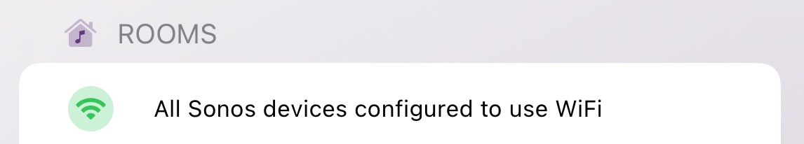An iOS app screenshot showing a label with the text 'All Sonos devices configured to use WiFi'